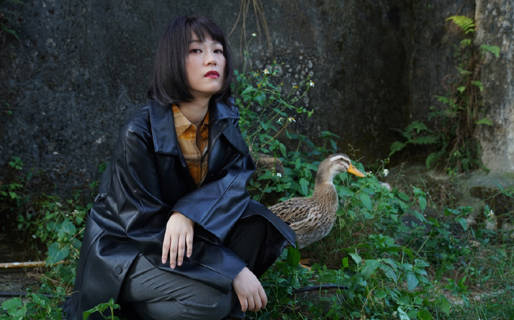 > 黄璐黑色皮衣a飒写真图片(9/9)